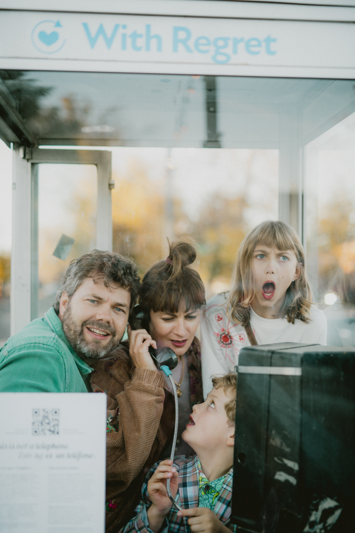 Family photo in a phone booth!