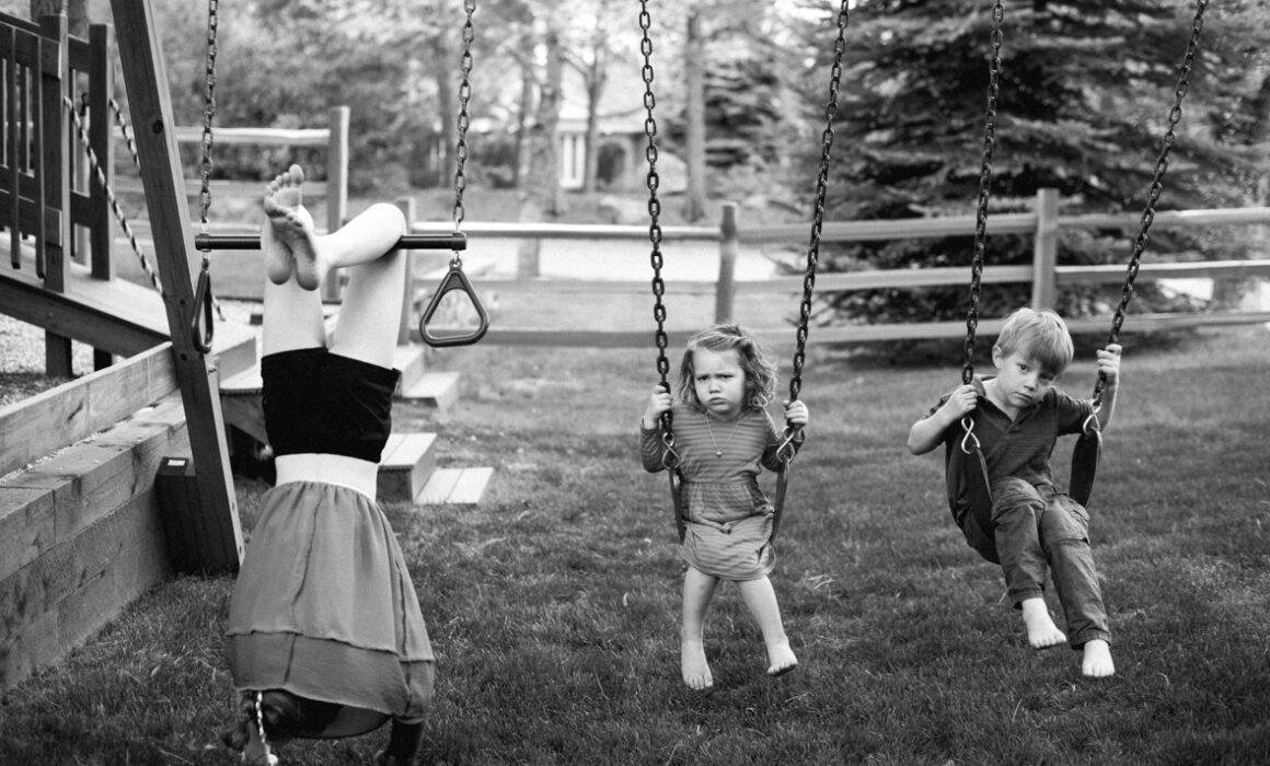 Kids swinging on swing set